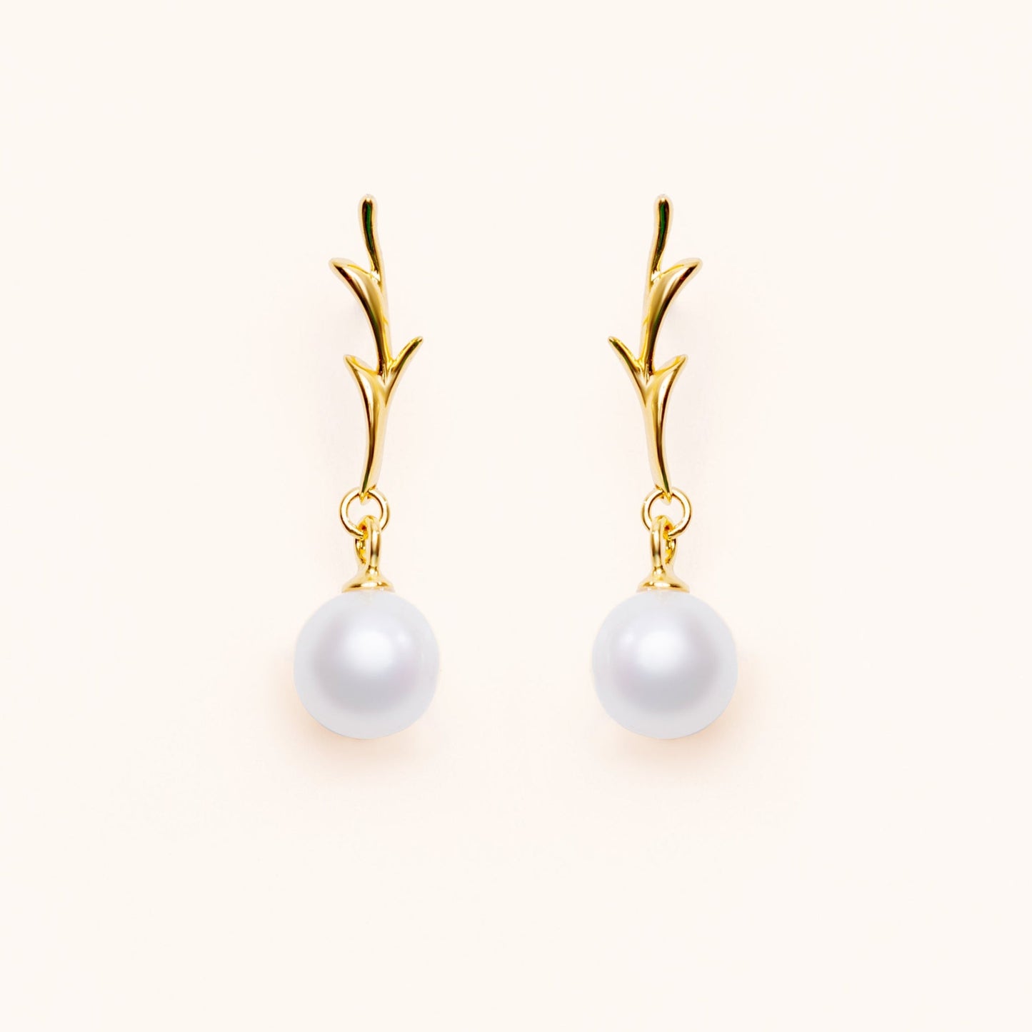 Branch shaped earrings in with gold plated silver and fresh water pearls