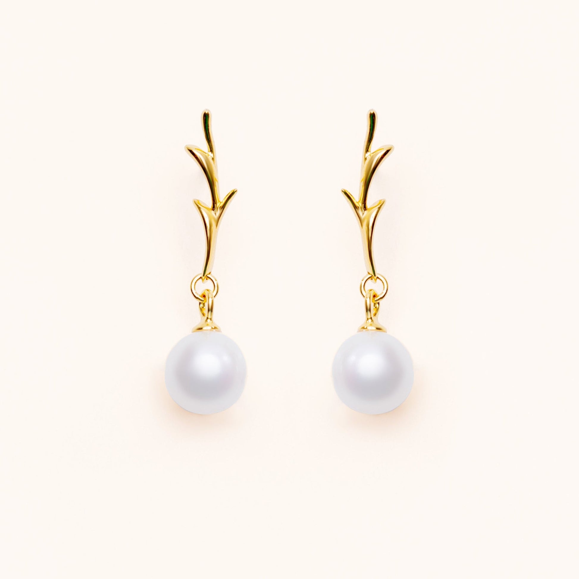 Branch shaped earrings in with gold plated silver and fresh water pearls