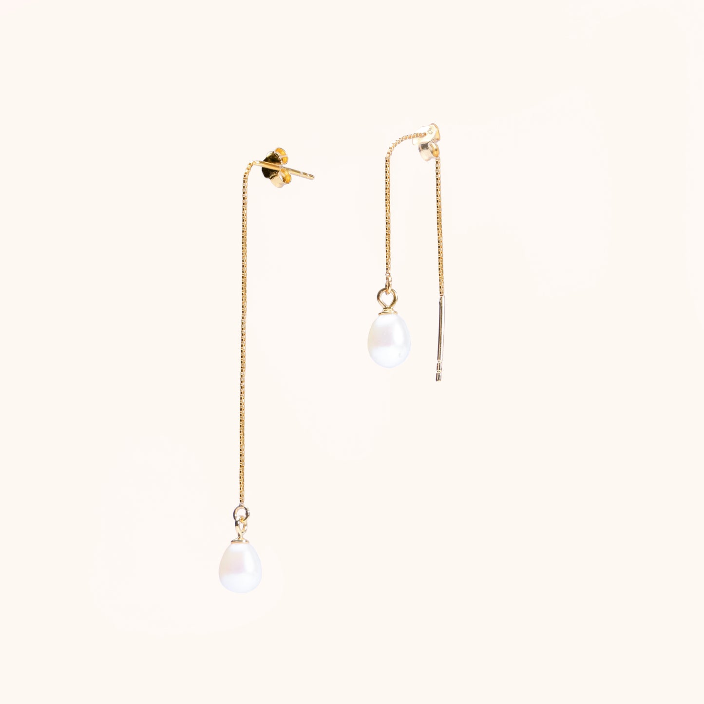 Adjustable earrings that dangle. Pearl and gold chain. Beautiful quality.
