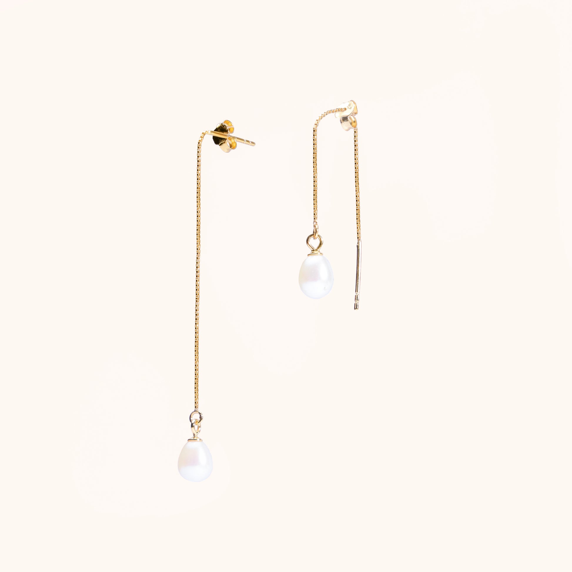 Adjustable earrings that dangle. Pearl and gold chain. Beautiful quality.