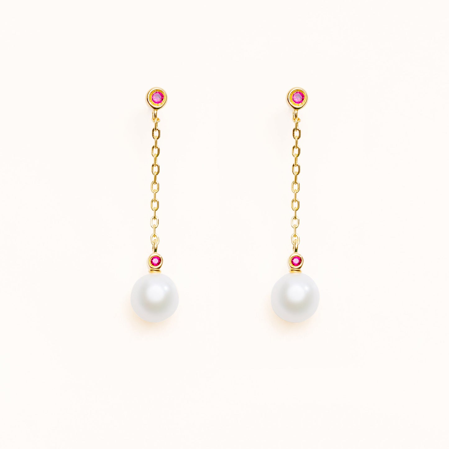 Pearl earrings with two beautiful red rubies