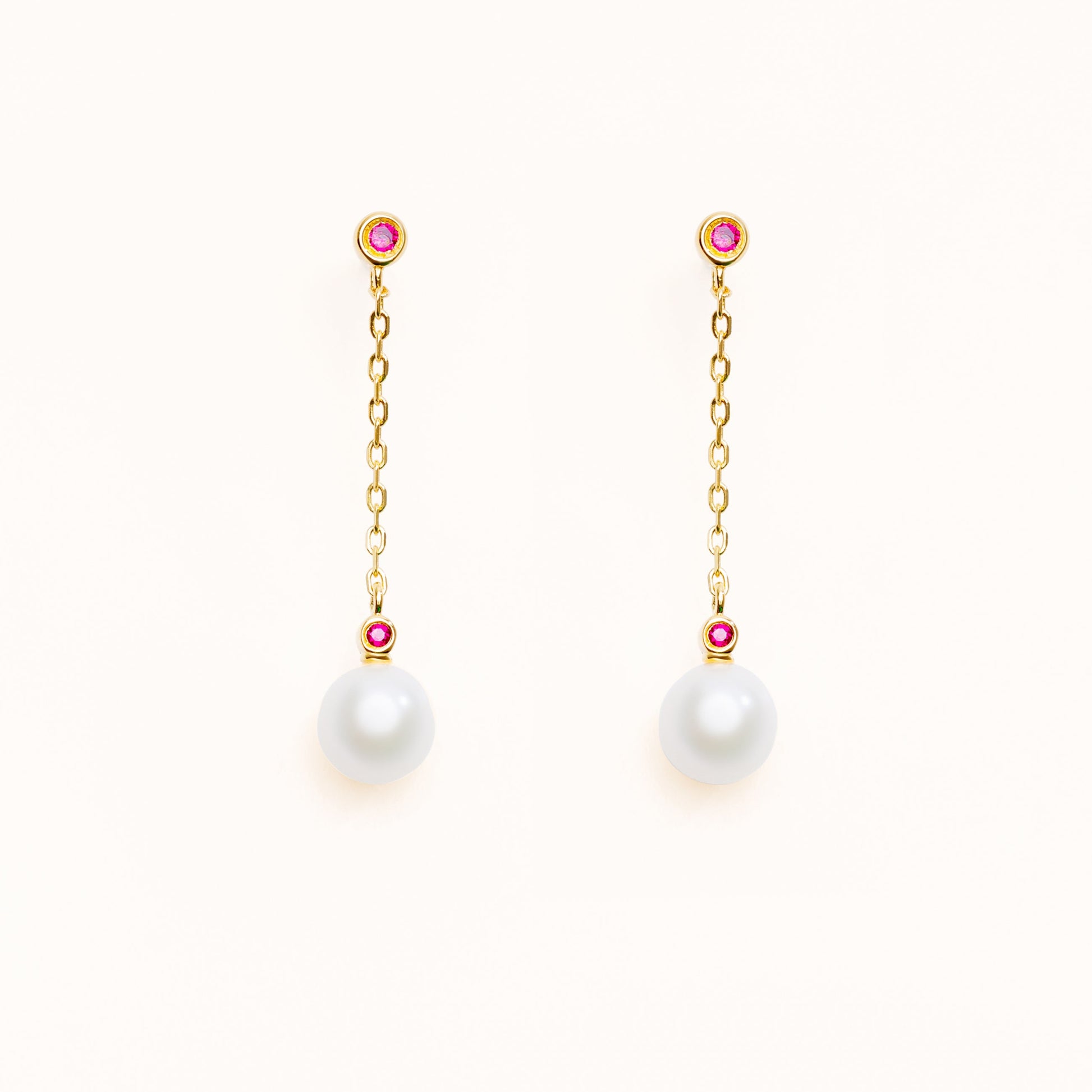 Pearl earrings with two beautiful red rubies