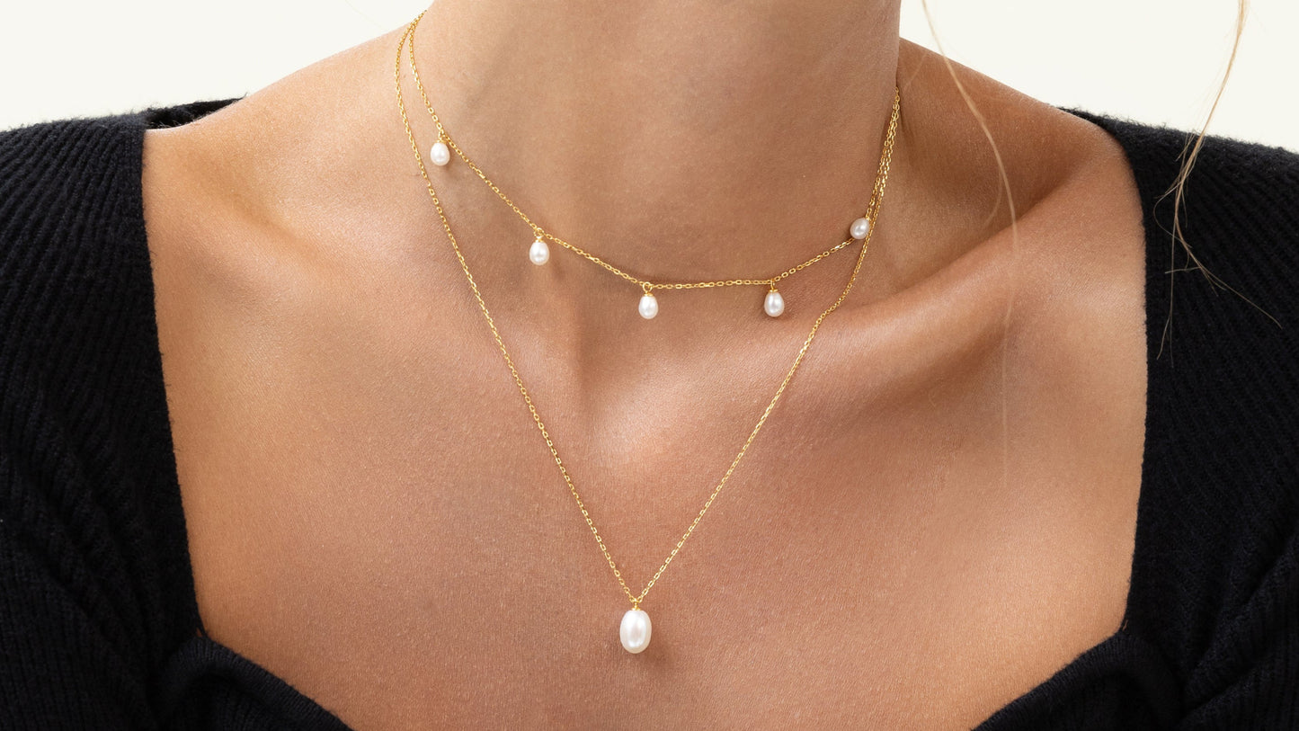 Pearl drop necklace with the dew drop pearl necklace. Pearl choker