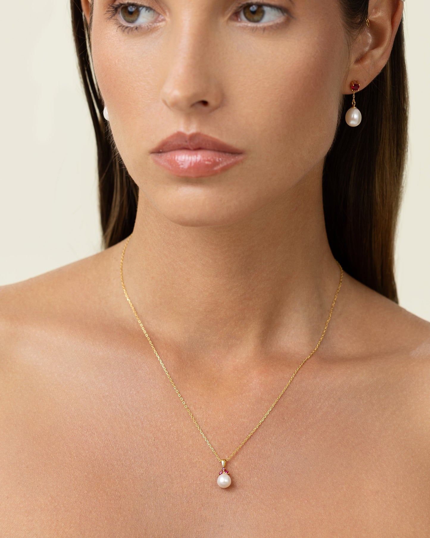 Pearl pendant with red rubies. Shaped like a beautiful fruit. Can be worn as choker or long.