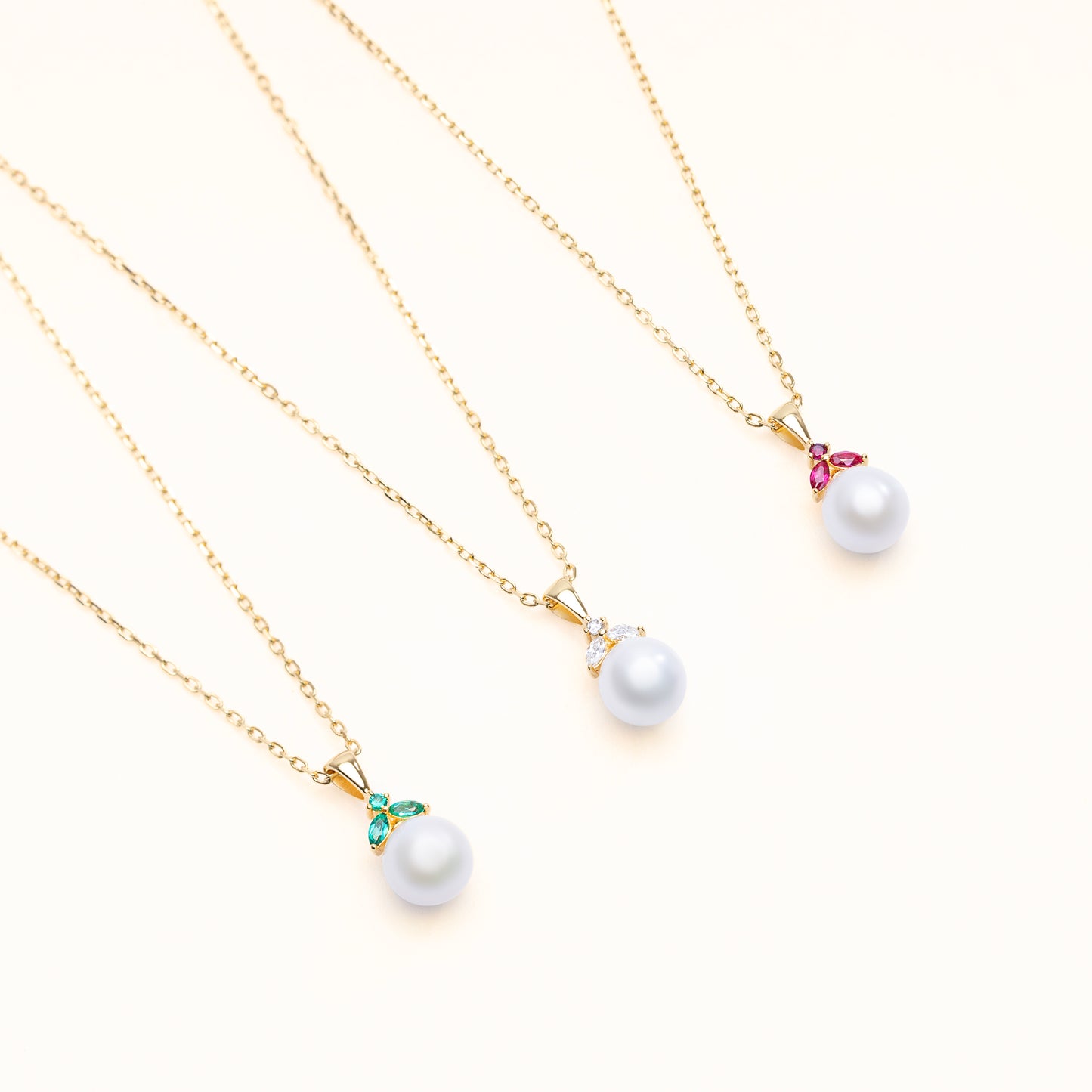 The pearlfruit pendant collection, with the option of lab-grown emerald, diamond, or rubies