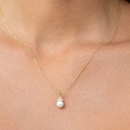 Pearl pendant with white diamonds. Shaped like a beautiful fruit. Can be worn as choker or long.