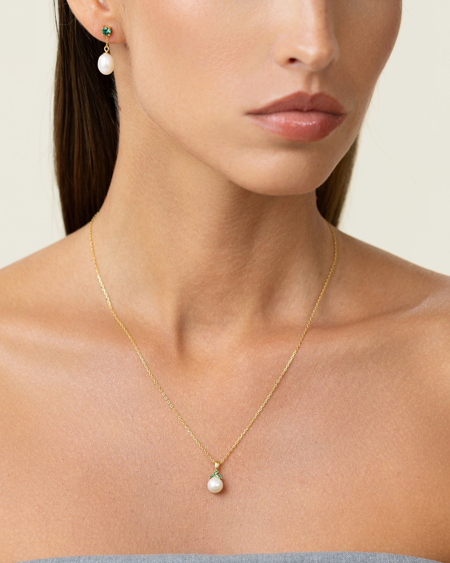 Dainty, cute, emerald pendant. Subtle and trendy pearl jewelry. Can be worn long or as a choker