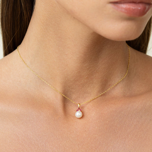 Pearl pendant with red rubies. Shaped like a beautiful fruit. Can be worn as choker or long.