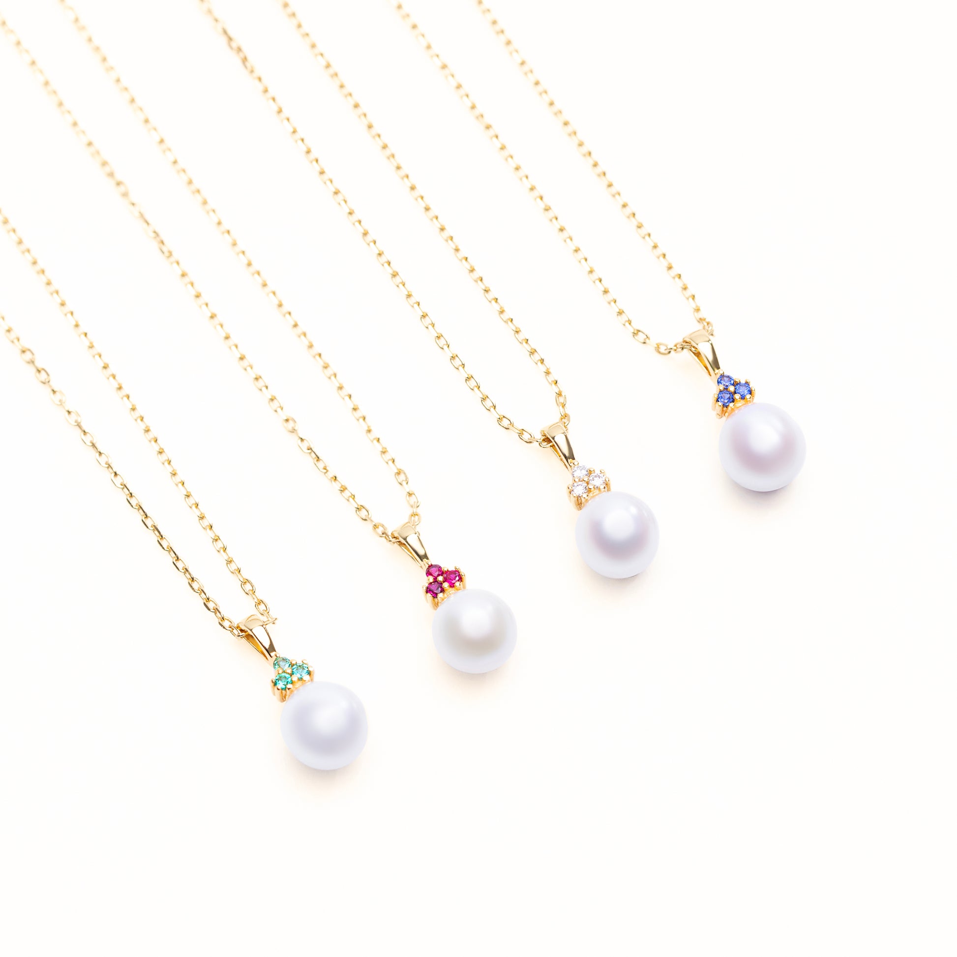 Trinity Pearl Pendant Collection with option of lab grown emeralds, rubies, diamond, and sapphires