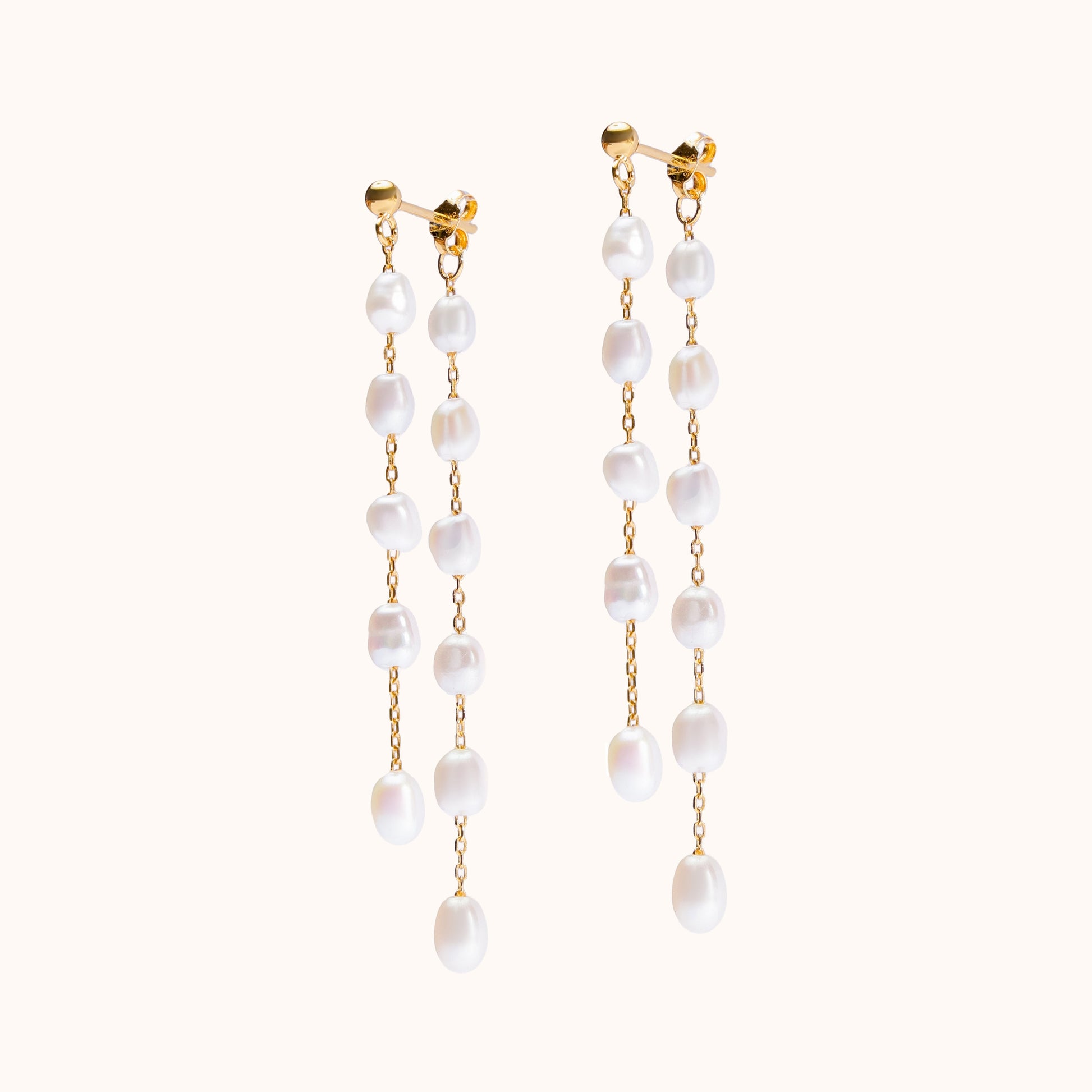 Double strand pearl dangling earrings. Perfect for weddings