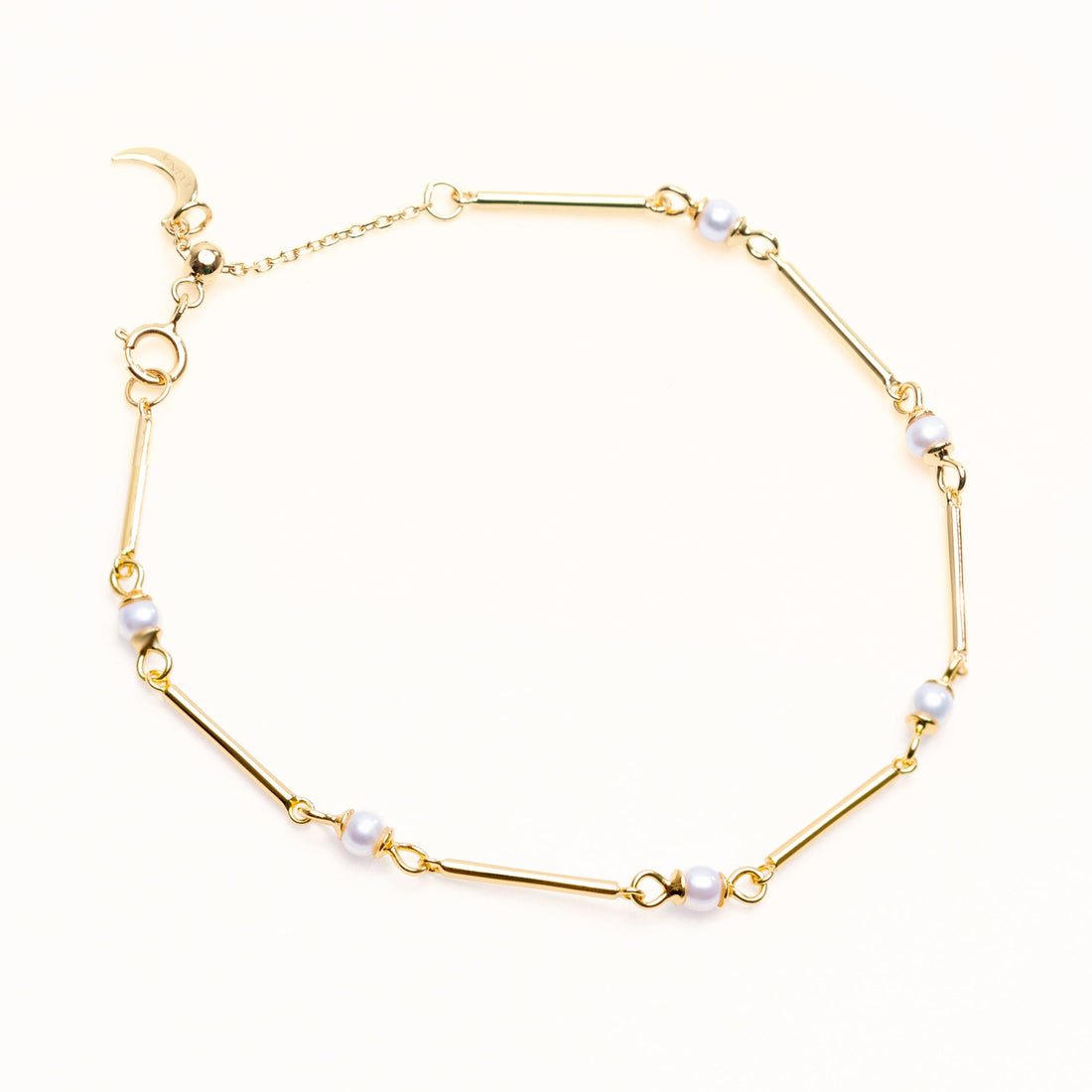 Freshwater pearl and 18k gold-plated sterling silver bar station bracelet with an adjustable sliding clasp