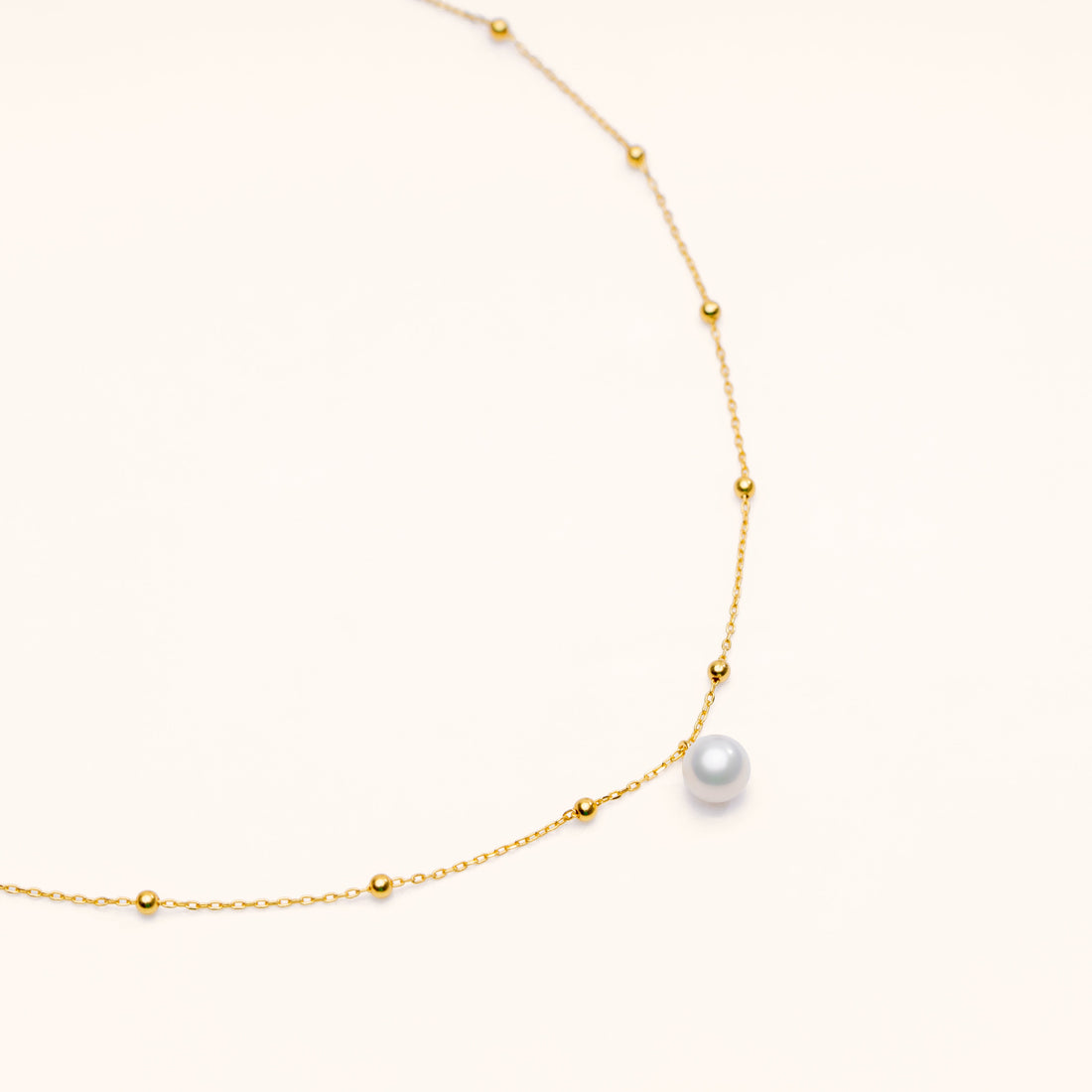 Beaded freshwater pearl necklace in sterling silver and 18k gold plating
