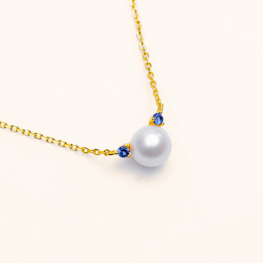 Freshwater pearl necklace with a blue lab-grown sapphire accent in 18k gold-plated sterling silver