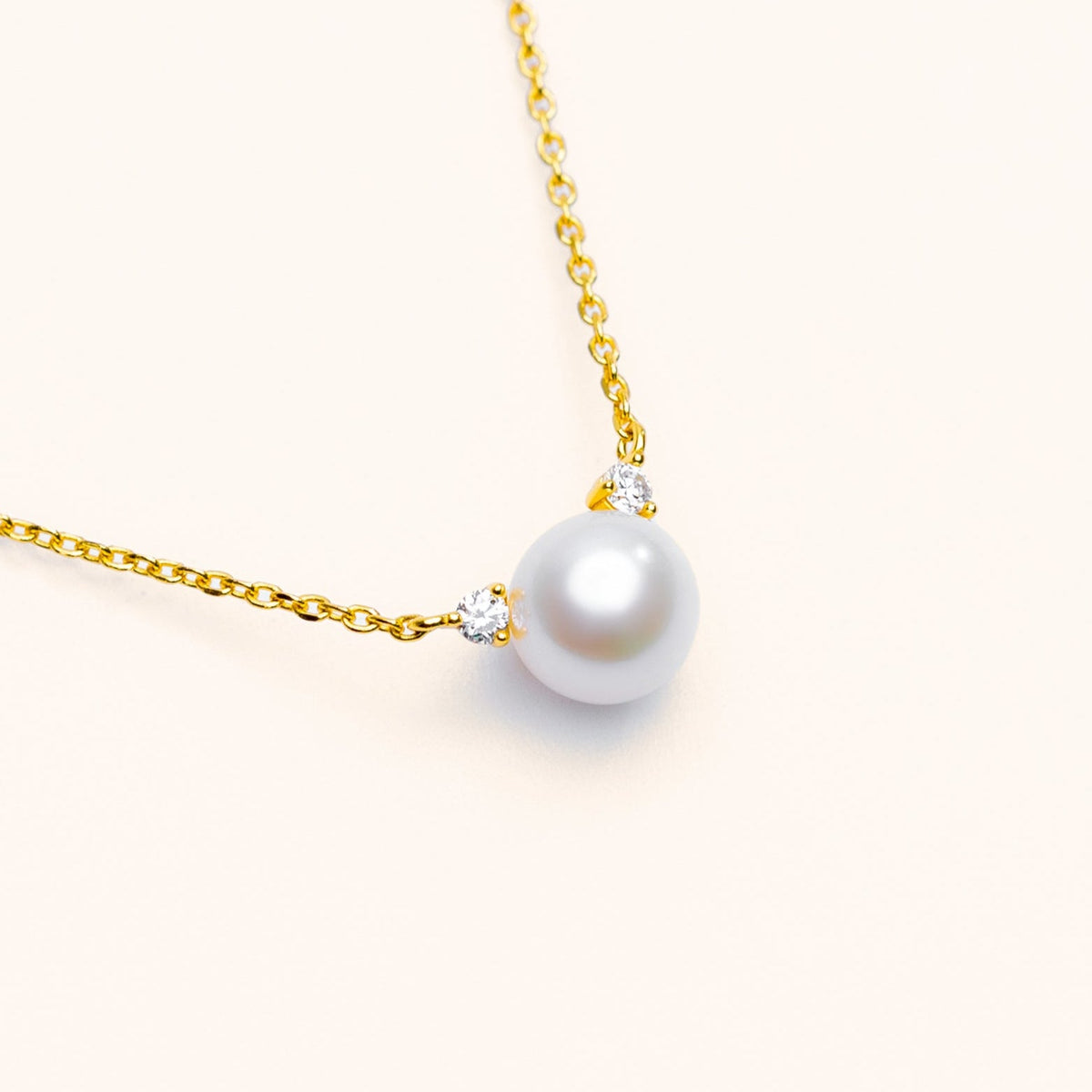 Freshwater pearl necklace with a small lab-grown diamond accent on an 18k gold-plated sterling silver chain