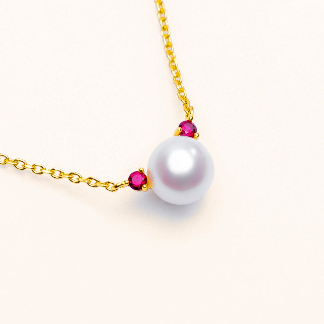 Freshwater pearl necklace with a red lab-grown ruby accent in 18k gold-plated sterling silver