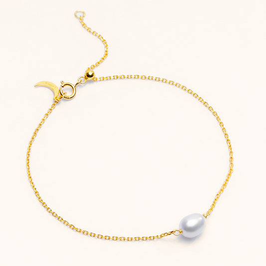 Single freshwater pearl bracelet in sterling silver and 18k gold, sized for a comfortable everyday fit