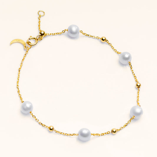 Dainty freshwater pearl bead bracelet in sterling silver and 18k gold, an anchor piece for a summer bracelet stack